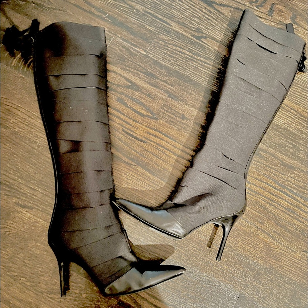 Black Italian leather high boots with wrap around material. Made in Italy